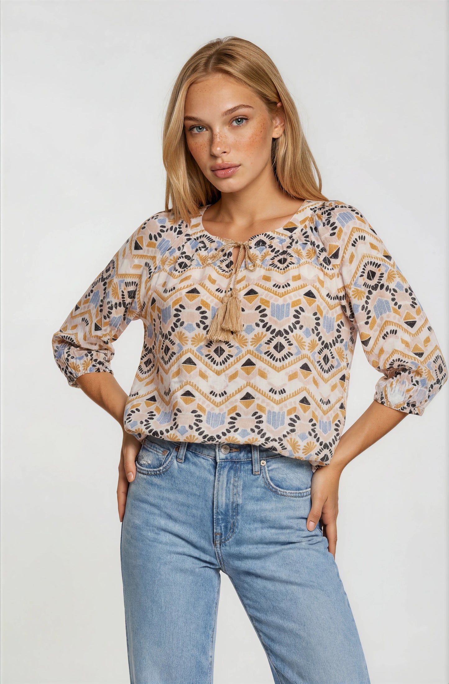 GEOMETRIC PRINTED TASSEL DRAWSTRING TOP