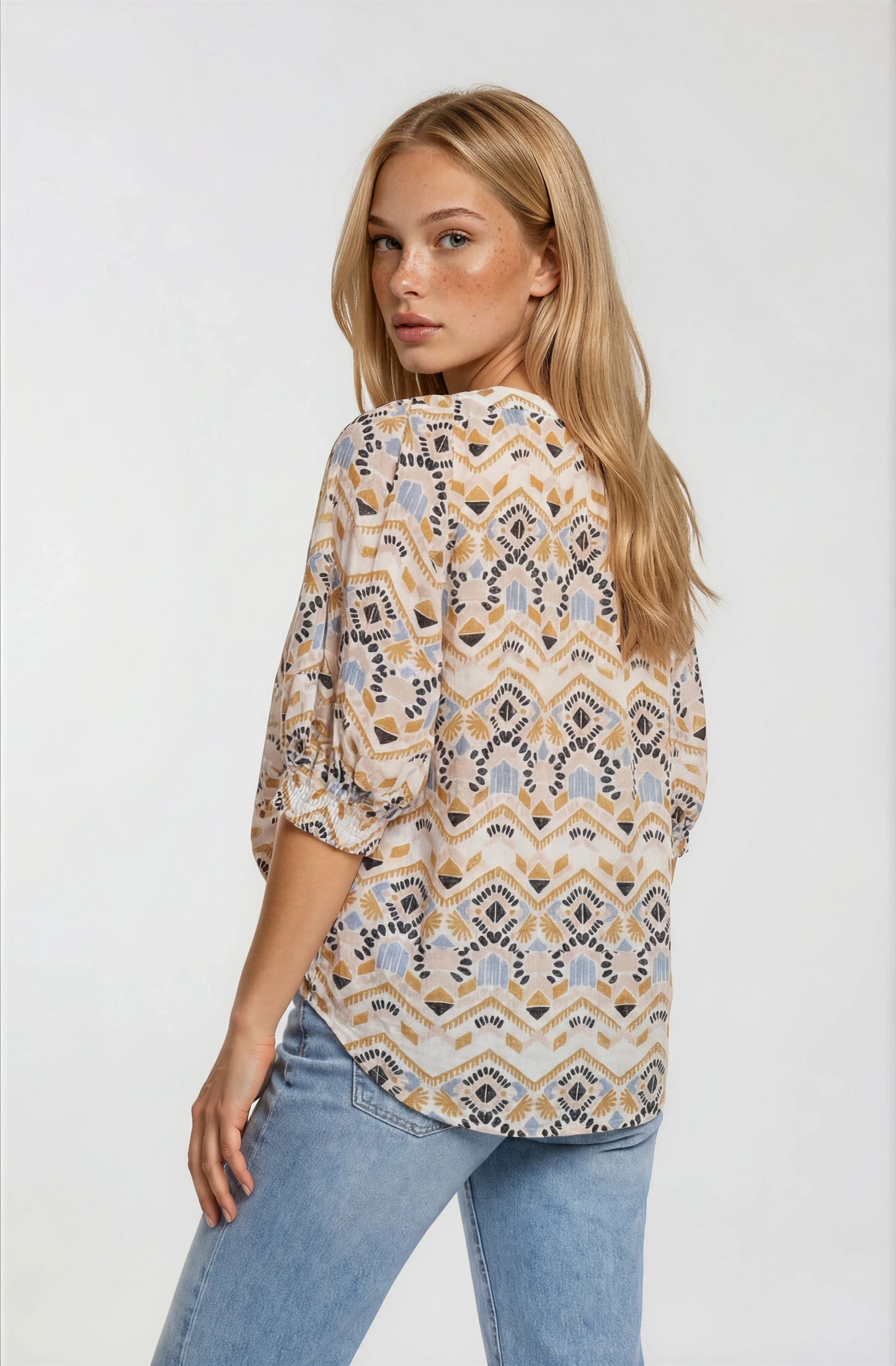 GEOMETRIC PRINTED TASSEL DRAWSTRING TOP