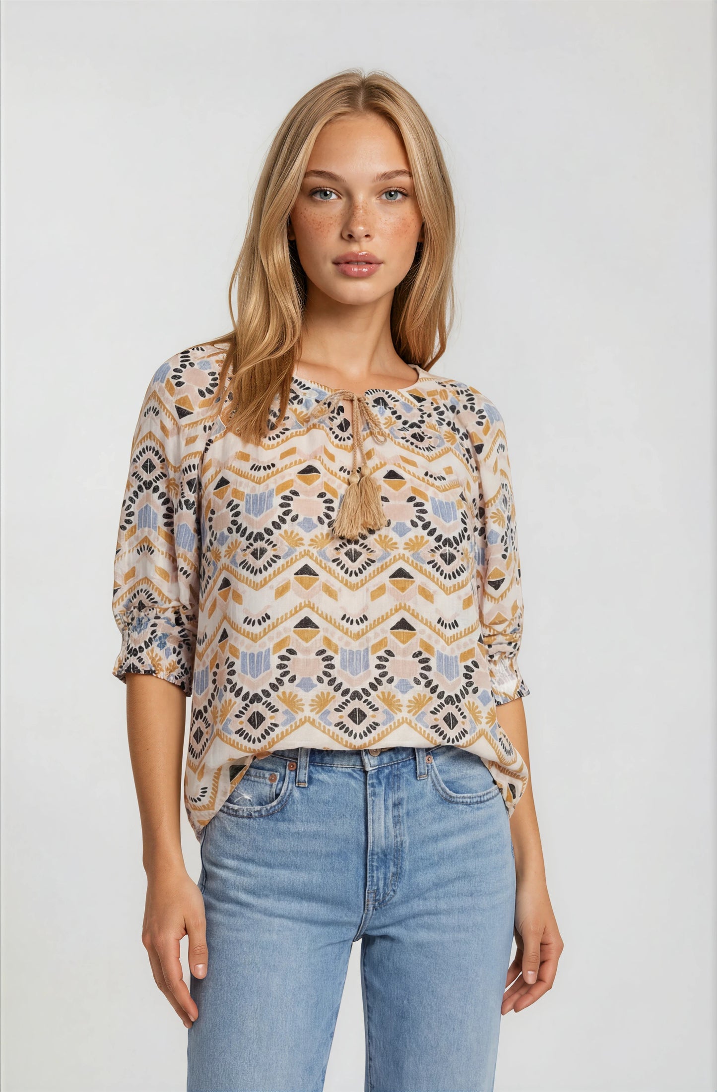 GEOMETRIC PRINTED TASSEL DRAWSTRING TOP