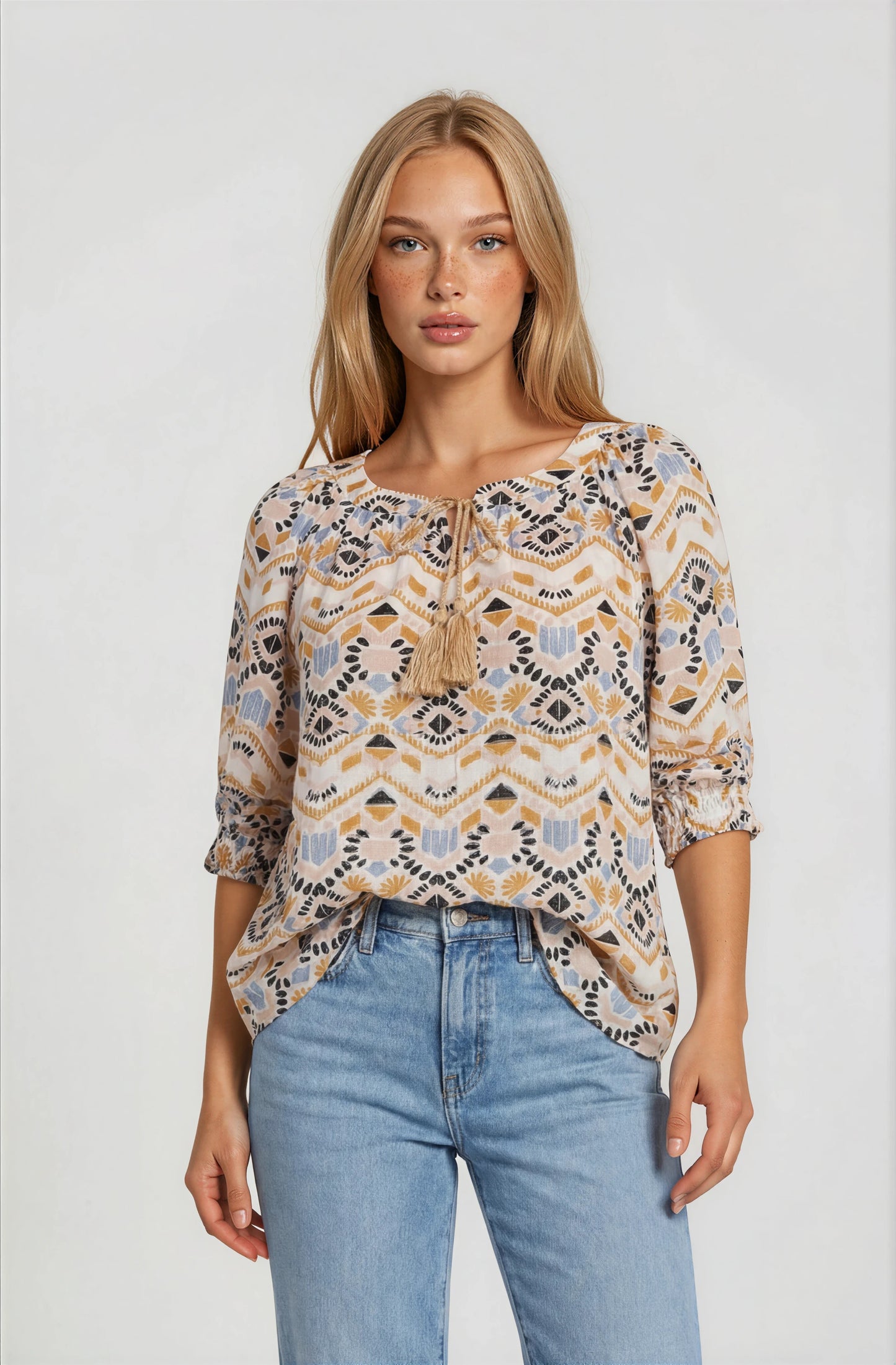 GEOMETRIC PRINTED TASSEL DRAWSTRING TOP